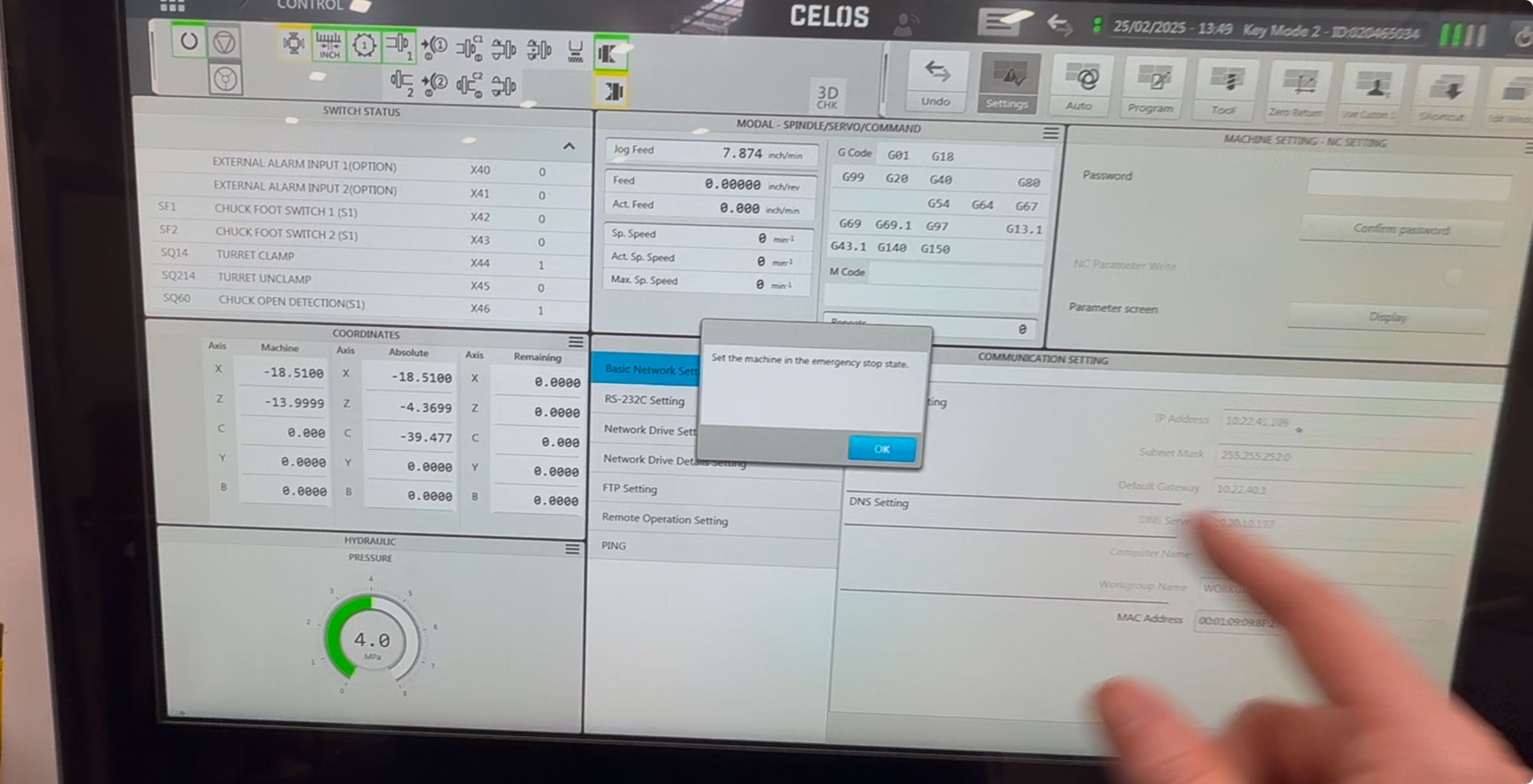 Dialog prompt: "Set the machine in the emergency stop state" — required before editing IP address